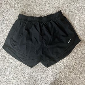 Black Nike running shorts